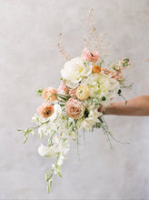 Load image into Gallery viewer, Mixed creme & peach  colored  
 bridal bouquet with mixed roses, ranunculus  &  orchids for your Hawaii beach wedding on  Oahu