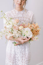 Load image into Gallery viewer, Creme & peach orchid & rose bridal bouquet