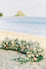 Load image into Gallery viewer, Oahu Hawaii ceremony beach ground florals 
Hawaii ceremony altar with peach, coral & light blue & creme flowers