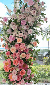 Lush wedding ceremony arch at Four Seasons Oahu